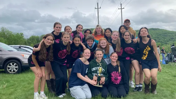 Team photo. Click to play frisbee pong.